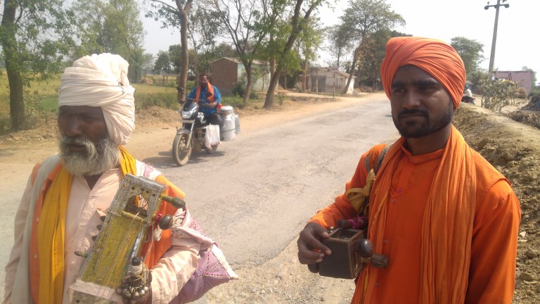Two jogis walking down the street in Gorakhpur. Credit: Manoj Singh