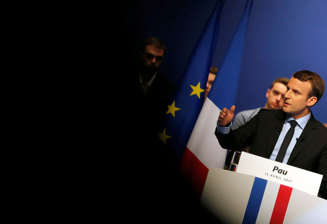 Emmanuel Macron, head of the political movement En Marche ! (Onwards !) and candidate for the 2017 presidential election, delivers his speech during a campaign rally in Pau, France, April 12, 2017. Credit: Reuters/Regis Duvignau