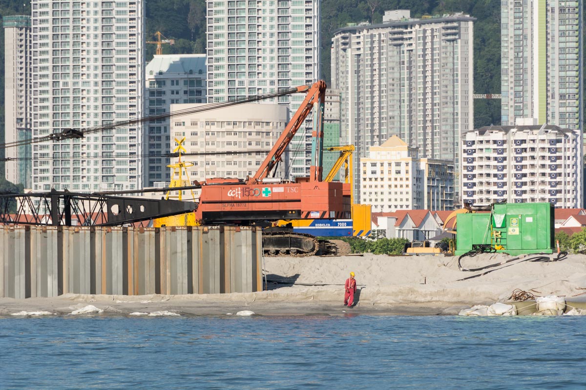 Reclamation building works underway as part of a new island being constructed by the Seri Tanjung Pinang company, a subsidiary of Oriental and Eastern company. Credit: Rod Harbinson via Mongabay