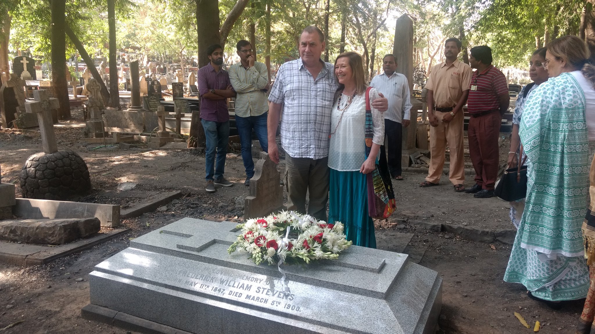 Diana Robertson and her husband Kevin at the grave of her great grandfather, the architect F W Stevens, in Mumbai. Credit: Rajendra B Aklekar