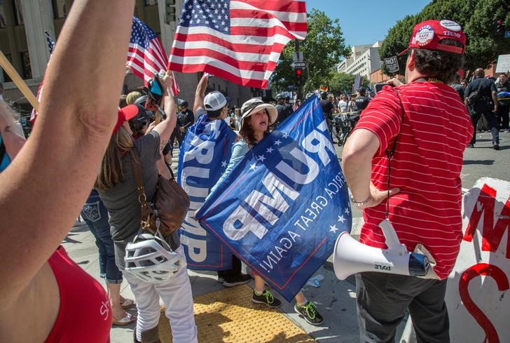 US President Donald Trump supporters shout at protesters during the May Day protest march in Los Angeles, California, US, May 1, 2017. Credit: Reuters/Kyle Grillot