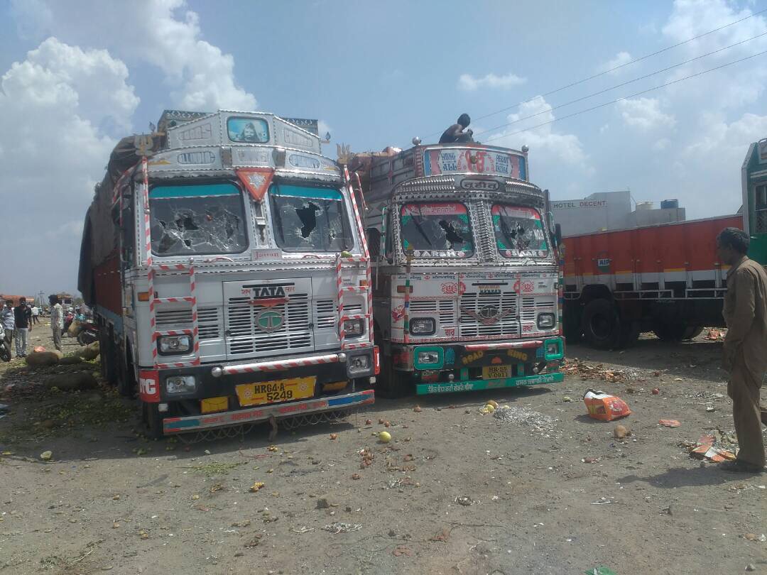 Vandalised trucks. Credit: Varsha Torgalkar