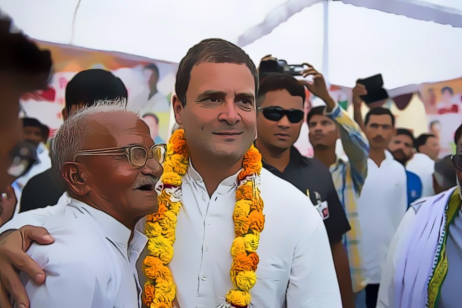 Rahul Gandhi with Congress supporters at a rally. Credit: Facebook