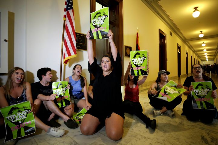 Healthcare activists protest to stop the Republican health care bill at Russell Senate Office Building on Capitol Hill in Washington. Credit: Reuters/Yuri Gripas