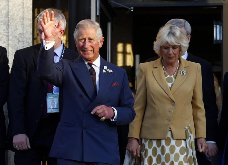 Britain's Prince Charles and Camilla, Duchess of Cornwall, wave goodbye in Winnipeg, Manitoba, May 21, 2014. Credit: Reuters/Mark Blinch