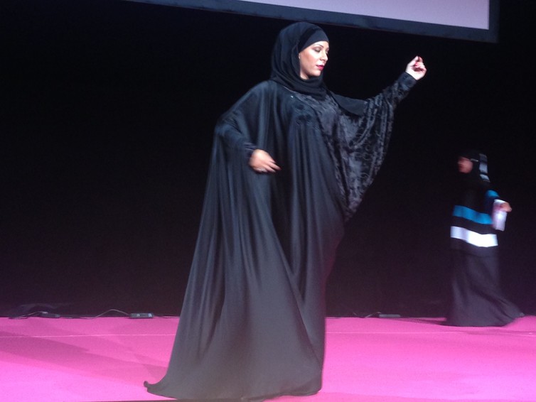 A fashion show in a French ‘Muslim women’ fair in Pontoise.‘ Credit: Carol Mann