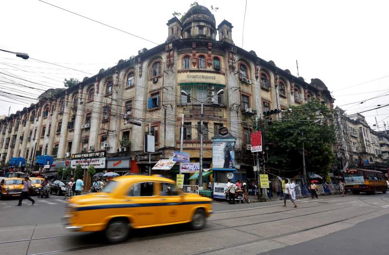 A taxi drives past the Mercantile office building at 9/12, Lalbazar Street, in Kolkata, August 14, 2017. Credit: Reuters/Rupak De Chowdhuri