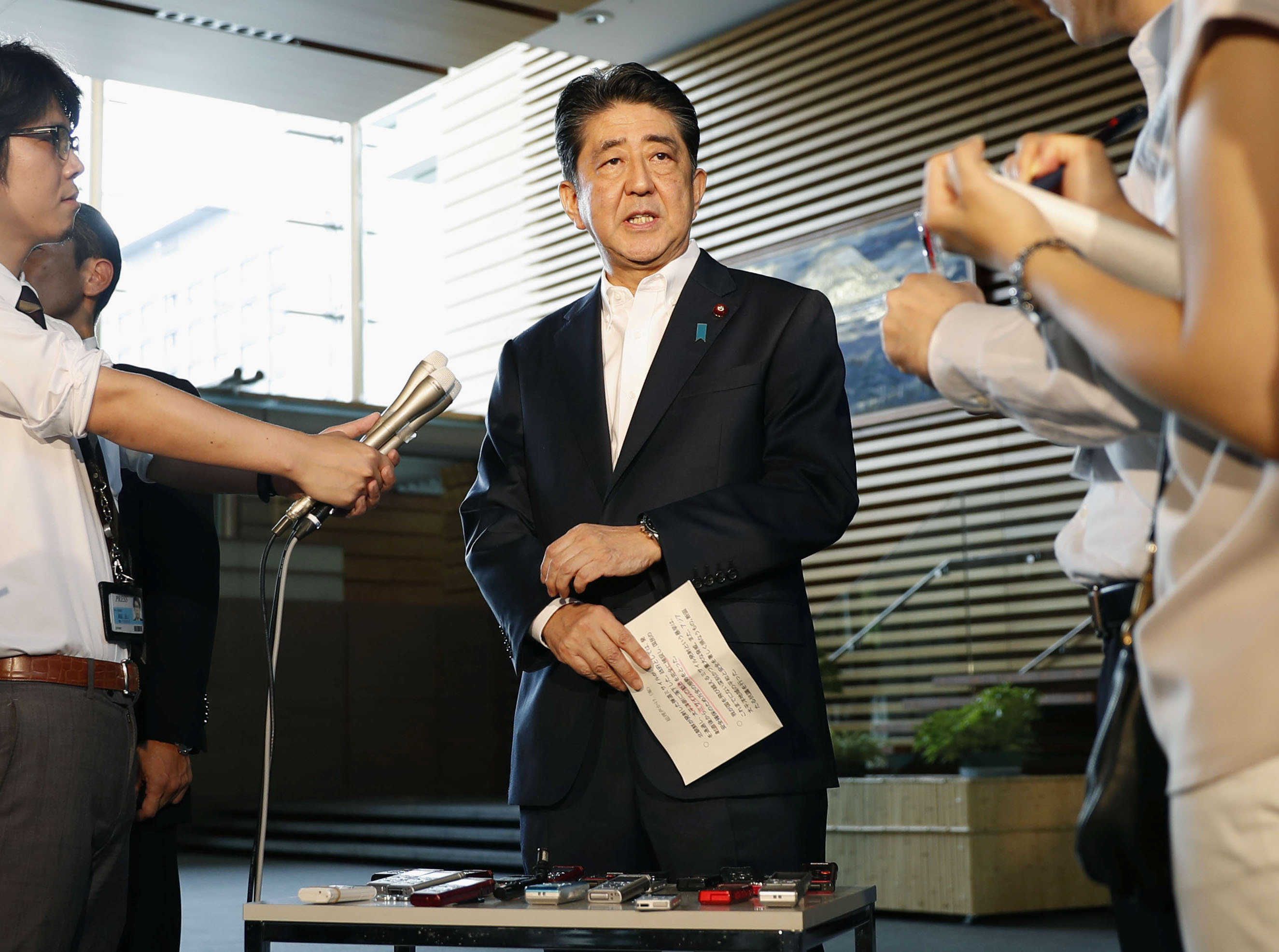 Japanese Prime Minister Shinzo Abe speaks to reporters about North Korea's missile launch in Tokyo, Japan in this photo taken by Kyodo on August 29, 2017. Credit: Kyodo/via Reuters