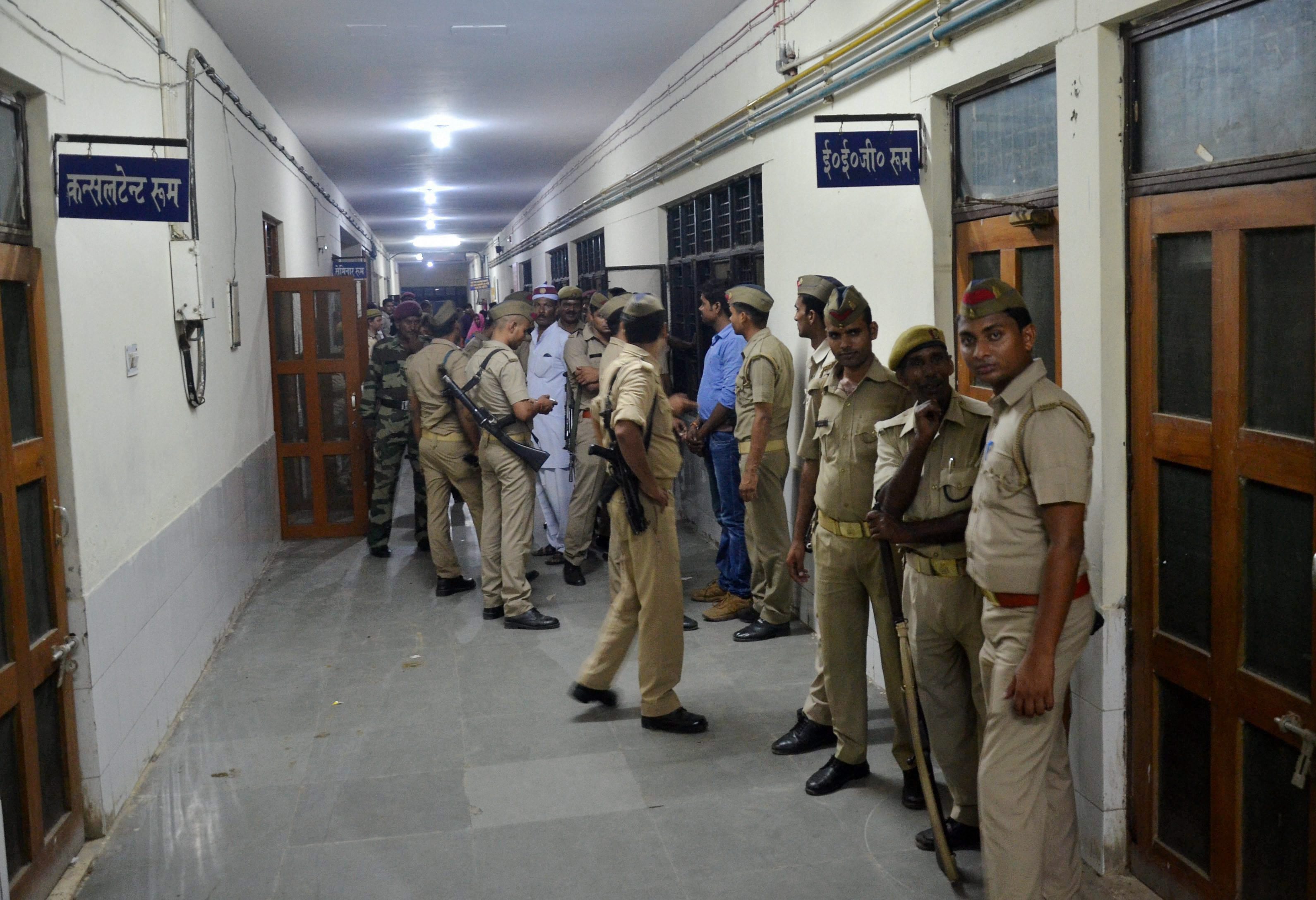 UP police inside the BRD Hospital for the investigation into the death. Credit: PTI
