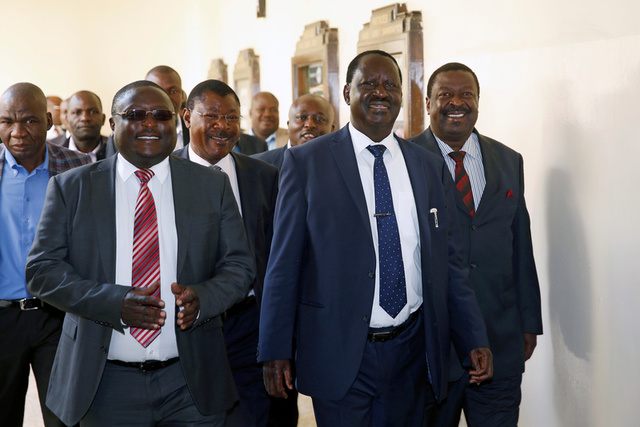 Kenyan opposition leader Raila Odinga (2R) from the National Super Alliance (NASA) coalition arrives for a hearing of a petition challenging the election result at the Supreme Court in Nairobi, Kenya August 28, 2017. Credit:Reuters