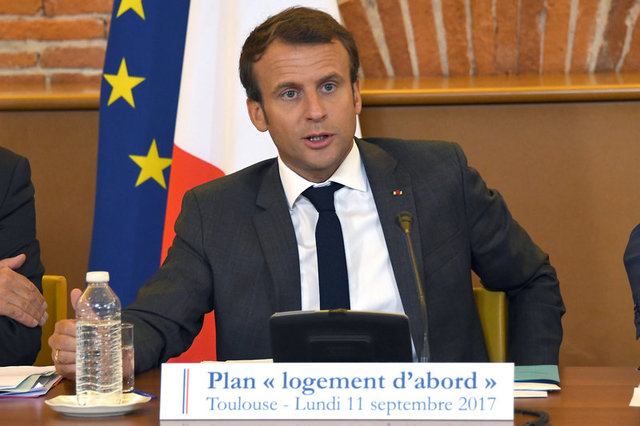 French President Emmanuel Macron speaks during a meeting on