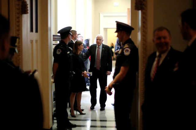 U.S. Senator John McCain (R-AZ) (C) departs after the weekly Republican caucus policy luncheon at the U.S. Capitol in Washington, U.S. September 19, 2017. Credit: Reuters