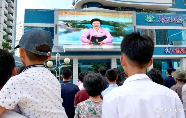 North Koreans watch a news report showing North Korea's nuclear test on electronic screen in Pyongyang, North Korea, in this photo taken by Kyodo September 3, 2017. Credit:Reuters