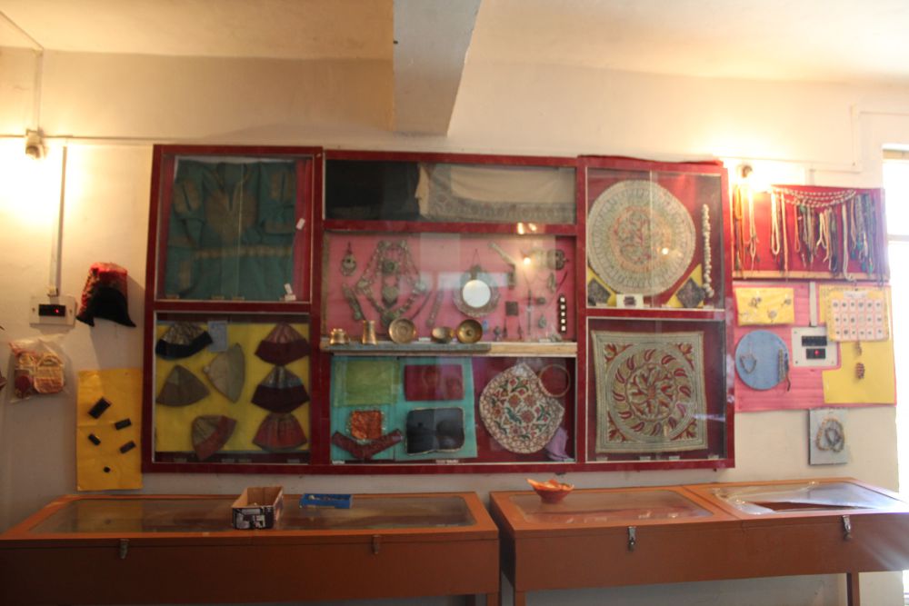 Jewelry, traditional Kashmiri caps and other items from the past stored in one of the rooms of the museum. Credit: Bhavneet Kaur