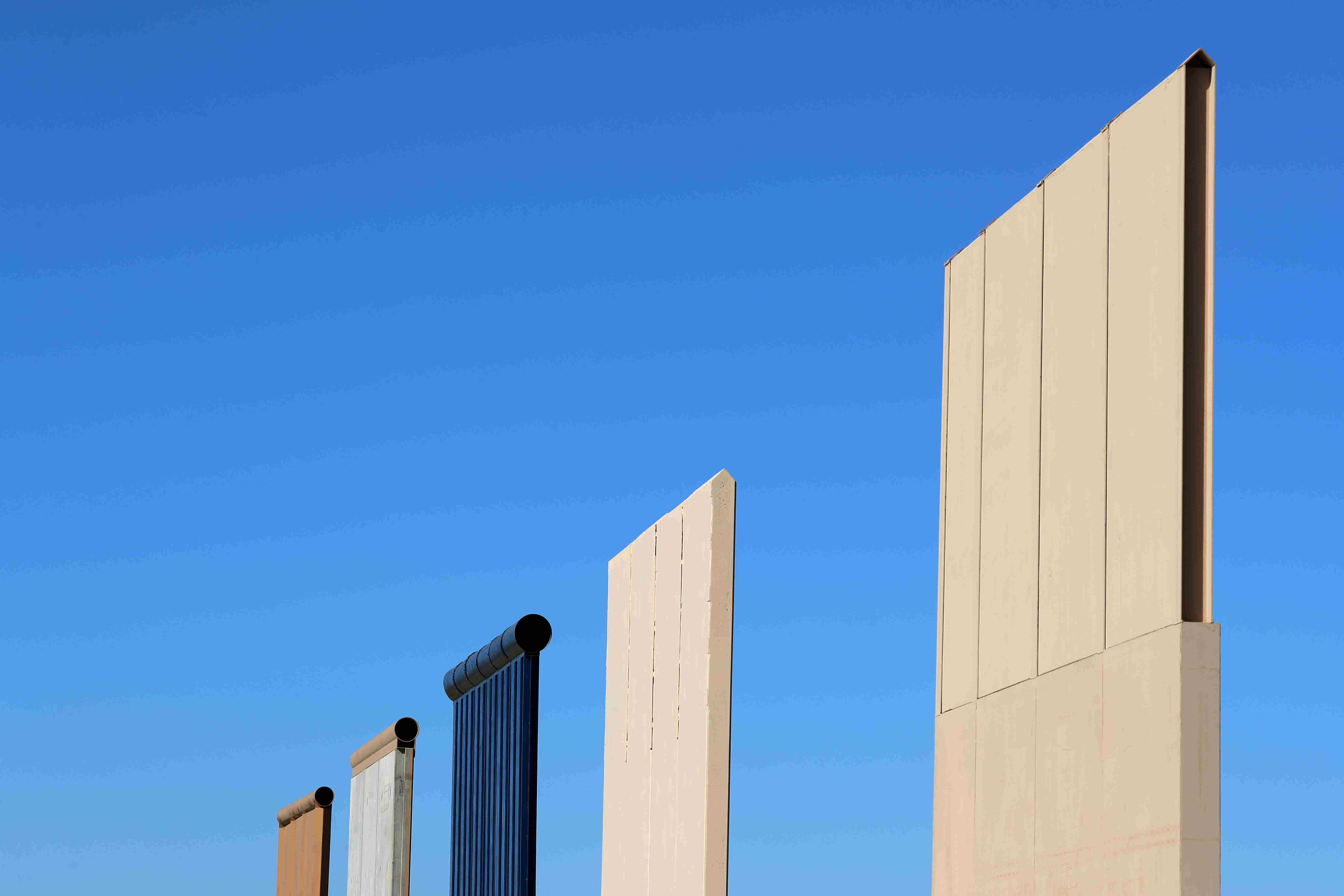 The top of five of U.S. President Donald Trump's eight border wall prototypes are shown near completion along U.S.- Mexico border near San Diego, California. Credit: Reuters/Mike Blake
