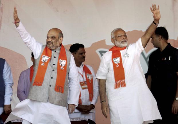 Prime Minister Narendra Modi with BJP president Amit Shah during the BJP rally in Gandhinagar. Credit: PTI