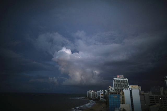 Dark clouds are seen over San Juan after Hurricane Maria hit Puerto Rico, September 29, 2017 Credit: Reuters