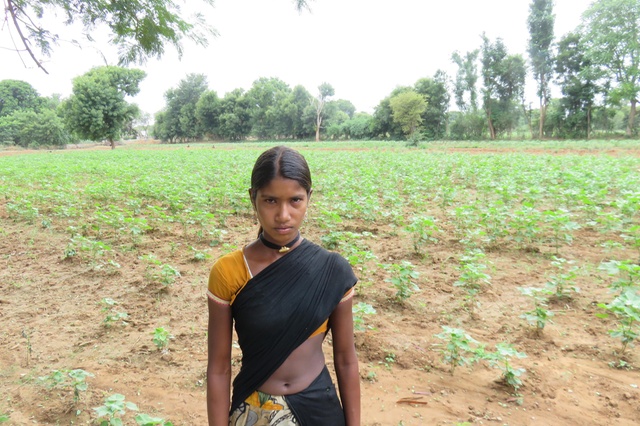 Maya is already married and had to drop out of school to graze the family's goats. Credit: swissinfo.ch