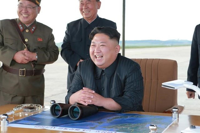 North Korean leader Kim Jong Un guides the launch of a Hwasong-12 missile in this undated photo released by North Korea's Korean Central News Agency (KCNA) on September 16, 2017. Credit: Reuters