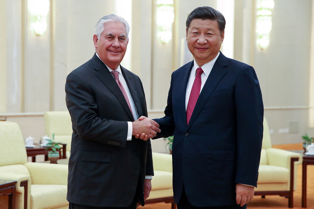 U.S. Secretary of State Rex Tillerson (L) shakes hands with Chinese President Xi Jinping (R) before their meeting at the Great Hall of the People on September 30, 2017 in Beijing, China. Credit: Reuters