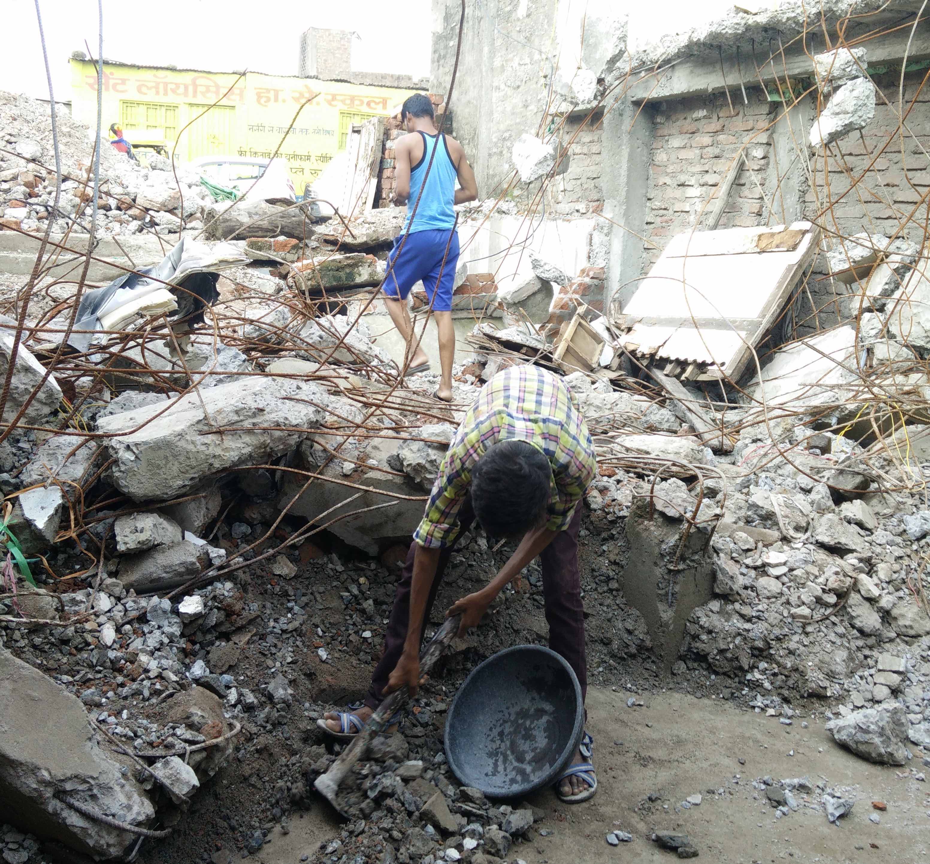 Workers clearing debris at from Sultanabi Shaikh’s house which was demolished in the drive. Credit: The Wire