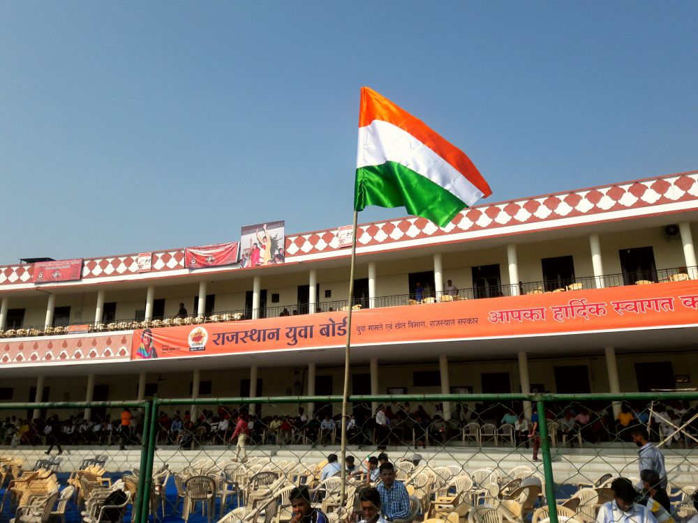 Several flags without Ashoka Chakra were hoisted and distributed at the event in Jaipur. Credit: Shruti Jain
