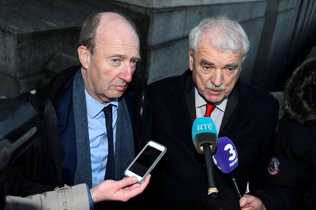 Transport Minister Shane Ross (L) and Finian McGrath, both of the Independent Alliance Party speak to media as they arrive at Government buildings in Dublin, Ireland, November 28, 2017. Credit: Reuters/Clodagh Kilcoyne