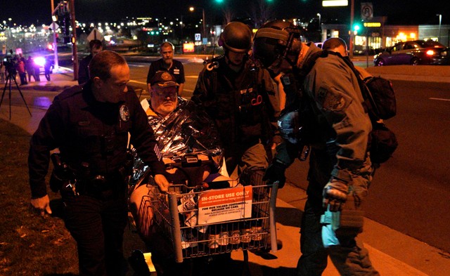 Patrick Carnes is evacuated in a Walmart cart by SWAT medics from the scene of a shooting at a Walmart where Carnes was shopping in Thornton, Colorado November 1, 2017. Credit: Reuters/Rick Wilking