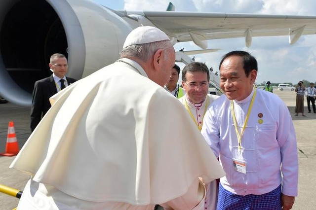 Pope Francis is welcomed as he arrives at Yangon International Airport, Myanmar November 27, 2017. Osservatore Romano/Handout via Reuters