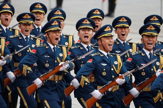 Military troops march during a welcoming ceremony for US President Donald Trump in Beijing, China, November 9, 2017. Credit: Reuters/Damir Sagolj