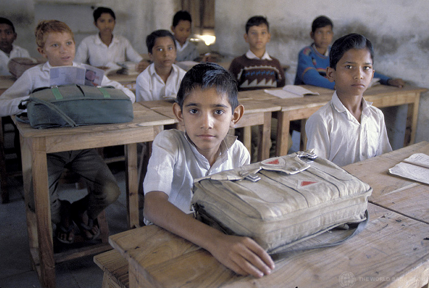 Despite high enrolment ratios of over 96% in the last eight years, improvement in reading outcomes and arithmetic ability continues to be low. Credit: World Bank/Curt Carnemark/Flickr (CC BY-NC-ND 2.0)