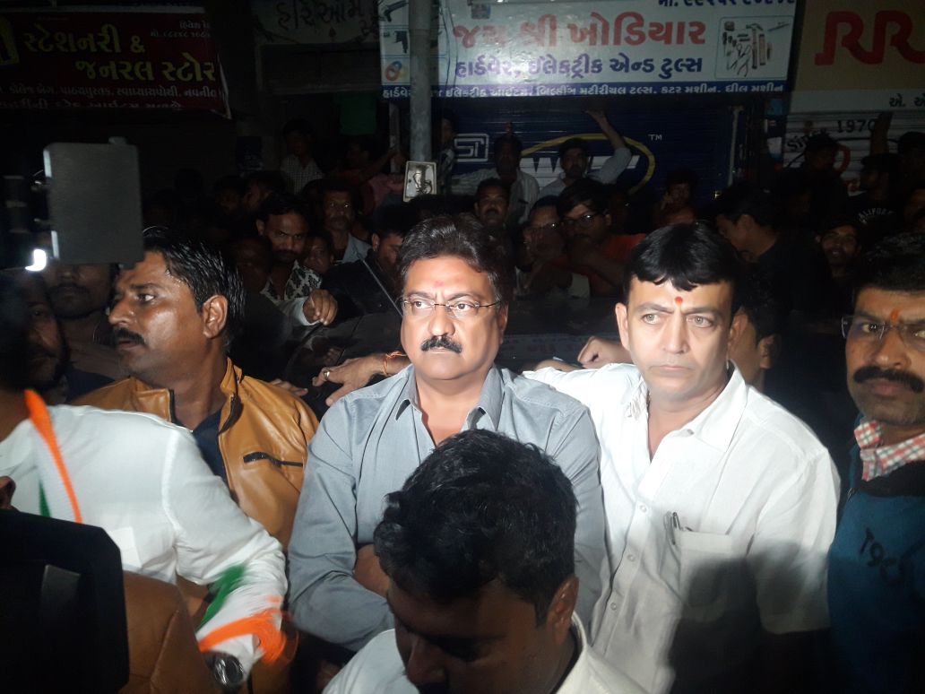 Indranil Rajguru along with other Congress leaders outside Vijay Rupani's residence. Credit: Damayantee Dhar