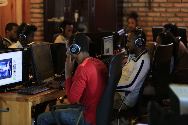 One of KANA TV’s dubbing team in a specially equipped sound-proof studio reading from his Amharic script to dub over a Turkish actor. Credit: James Jeffrey/IPS