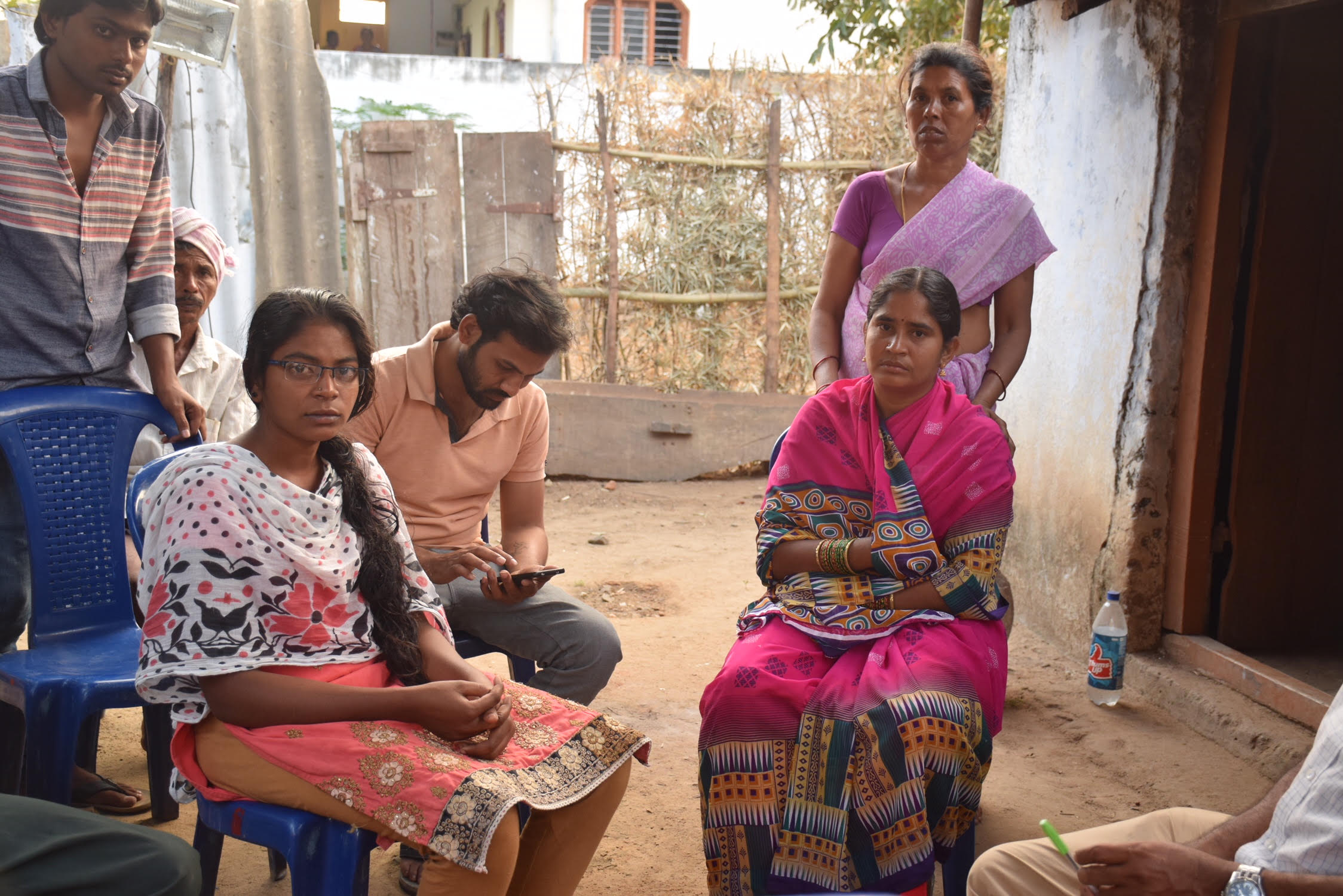 Nunawath Arjun’s sister Swati (sitting left) and his aunt Chandini Islawat (sitting on the right) have alleged that he was tortured before he was killed. Credit: Sukanya Shantha