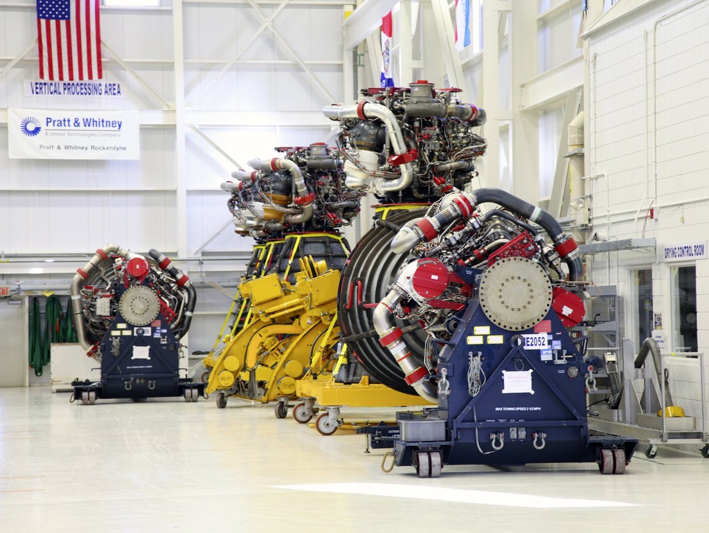 RS-25D engines line the wall of the Engine Processing Facility at Kennedy Space Center, Florida, 2012. Credit & caption: nasamarshall/Flickr, CC BY-NC 2.0
