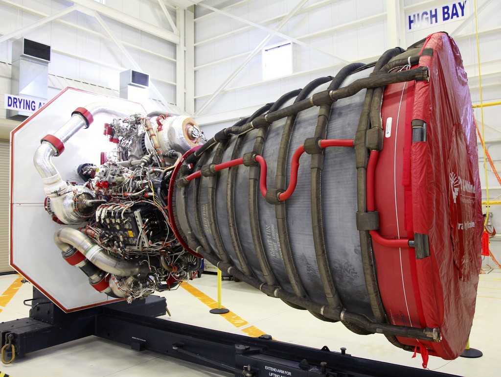A RS-25D engine in the Engine Processing Facility at Kennedy Space Center, Florida, is awaiting placement in a transportation canister for shipment to Stennis Space Center in south Mississippi, 2012. The 15 RS-25D engines used during the Space Shuttle Program will be stored at Stennis for future use on NASA's new heavy-lift rocket, the Space Launch System, which will carry NASA's new Orion spacecraft, cargo, equipment and science experiments beyond low-Earth orbit. Caption & credit: nasamarshall/Flickr, CC BY-NC 2.0