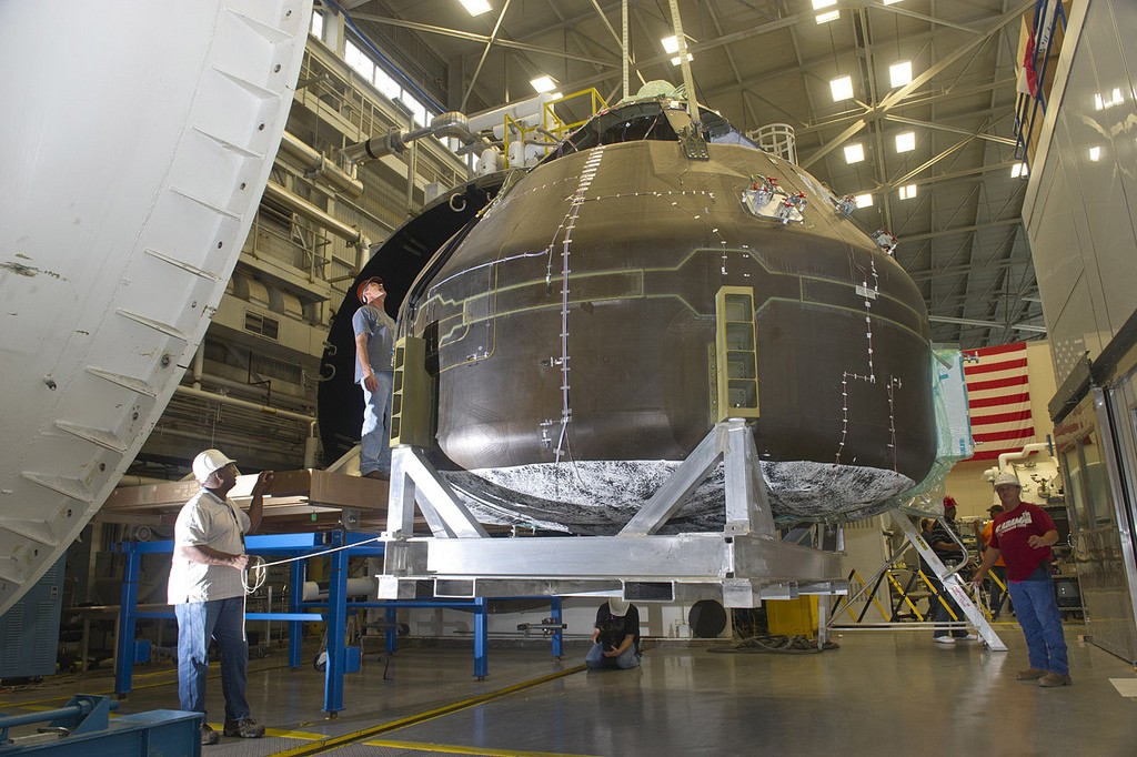 Engineers at NASA's Marshall Space Flight Center in Huntsville, Alabama, moved a Composite Crew Module into the Environmental Test Facility vacuum chamber to gauge how well a space structure fabricated with composite materials will react in a simulated space environment, 2012. Credit: nasamarshall/Flickr, CC BY-NC 2.0