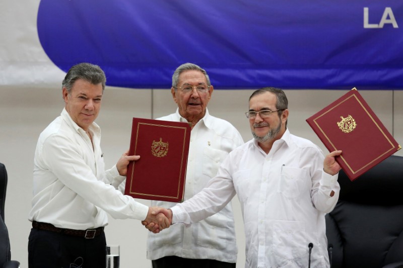 colombians celebrate as government and leftist rebels sign historic ceasefire deal