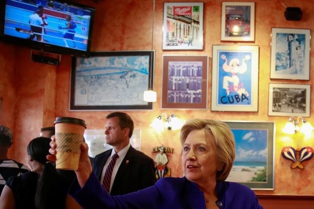 clinton attacks trump s  bizarre  foreign policy as dangerous to us safety