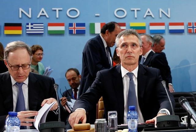 nato approves keeping large afghan basing  warns against withdrawing troops