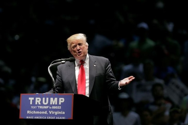 stung by criticism  trump vows to work for ethnic harmony