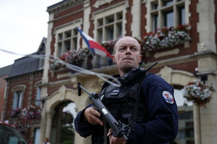 islamist attackers kill priest at french church