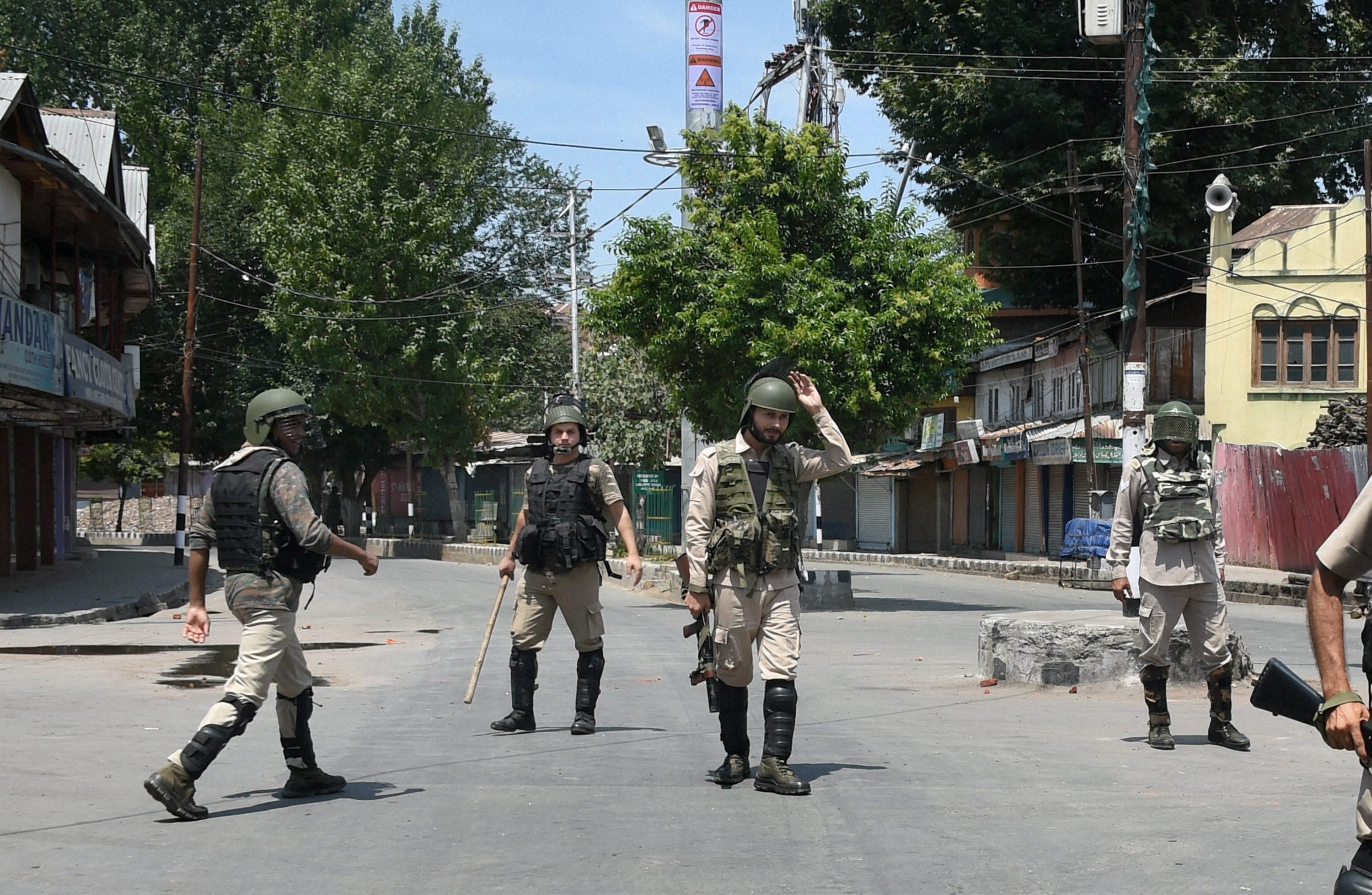 Srinagar: CRPF jawans patrolling a street during 29th day of curfew in Srinagar on Saturday. Credit: PTI/S. Irfan