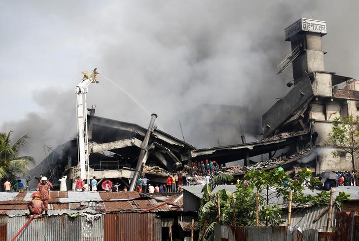 death toll in dhaka factory fire rises to 33  owner  managers on the run