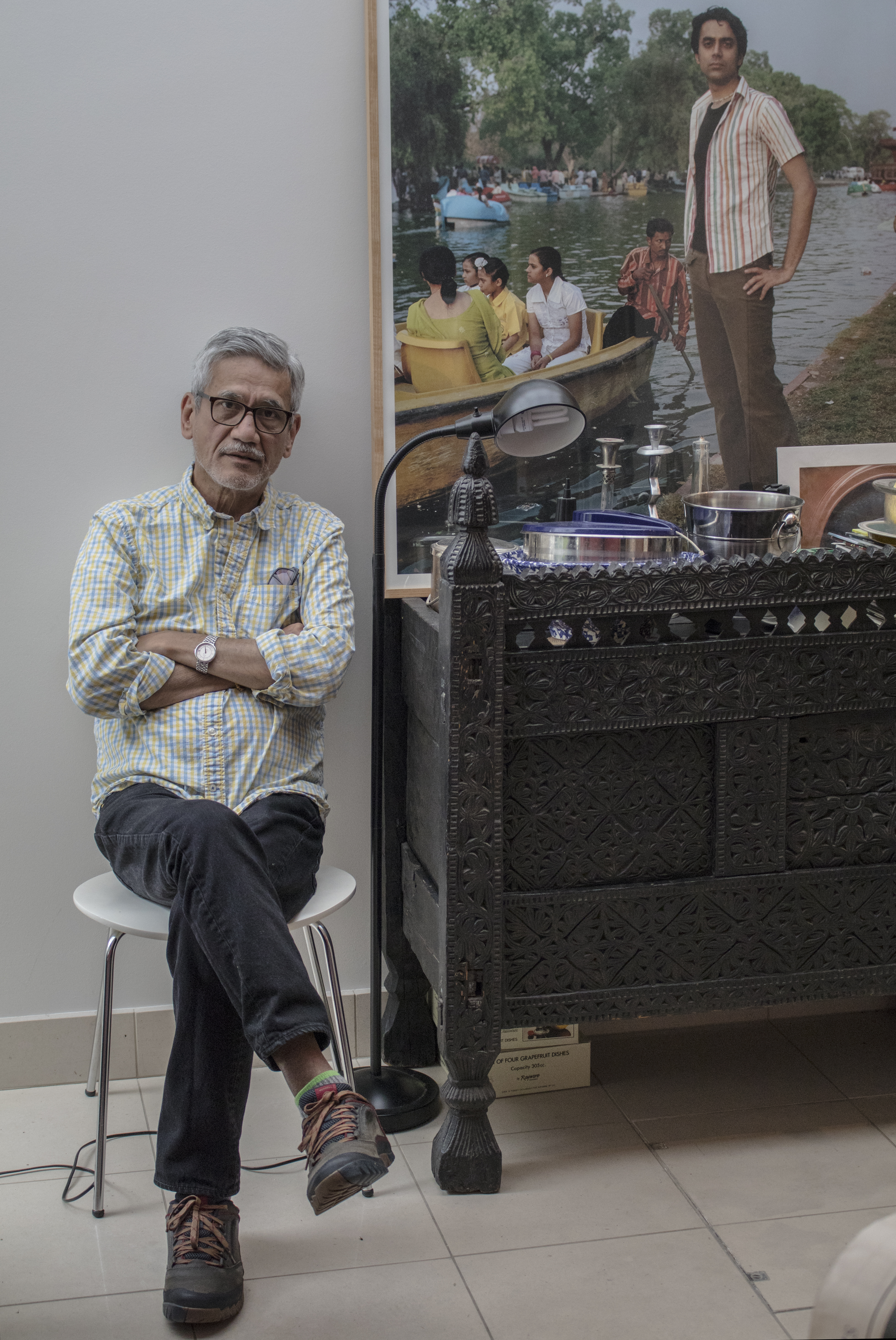 Sunil Gupta, photographer, seen with his work from India. He lives in London and apart from his own photographic practice, which has been seminal to gender studies through its portraits, Sunil teaches at the Royal College of Art, London. Credit: Paroma Mukherjee 