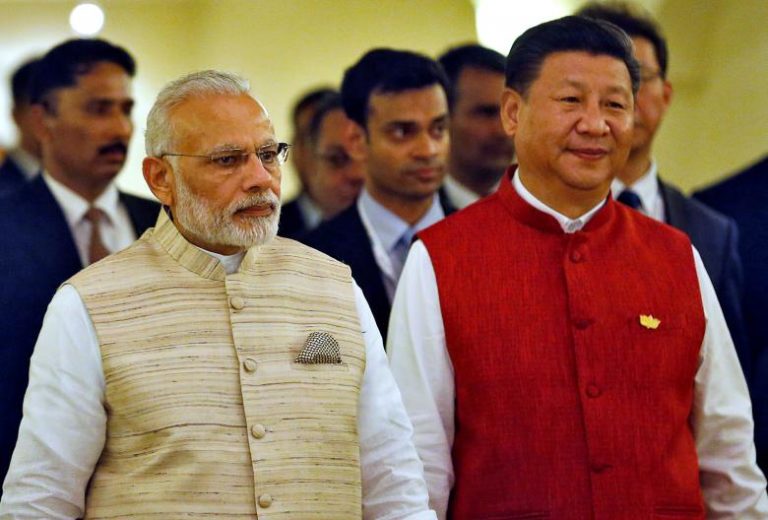 Indian Prime Minister Narendra Modi (L) and Chinese President Xi Jinping arrive for a photo opportunity ahead of BRICS (Brazil, Russia, India, China and South Africa) Summit in Benaulim, in Goa, India, October 15, 2016. Credit:Danish Siddiqui/Reuters/Files