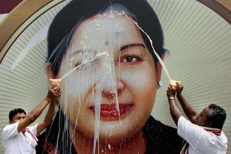  In Coimbatore, a group of party workers performed ‘milk abhishekam’ (pouring of milk) on a portrait of Jayalalithaa after she got acquitted in a court case in 2015. Credit: PTI