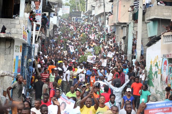 protests  gunshots and celebrations in haiti after preliminary presidential vote results