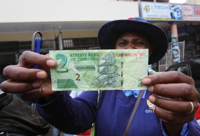 zimbabwe launches  bond notes  to ease cash crunch
