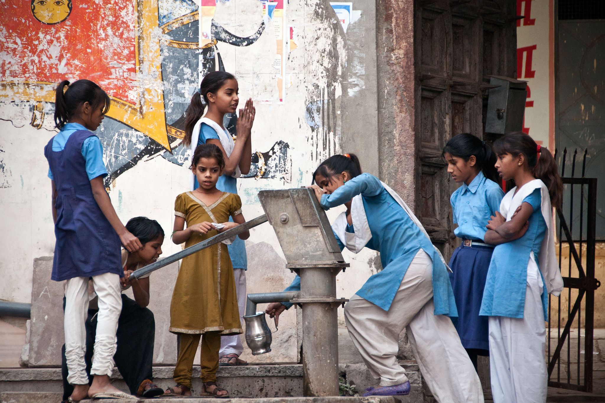 Schoolgirls pumping water from a tubewell. Image for representation only. Credit: Ingrid Truemper/Flickr CC BY-NC 2.0